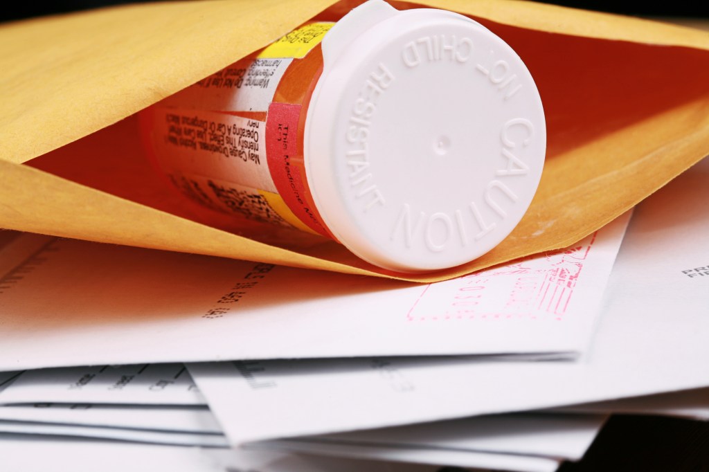 pill bottle in an envelope