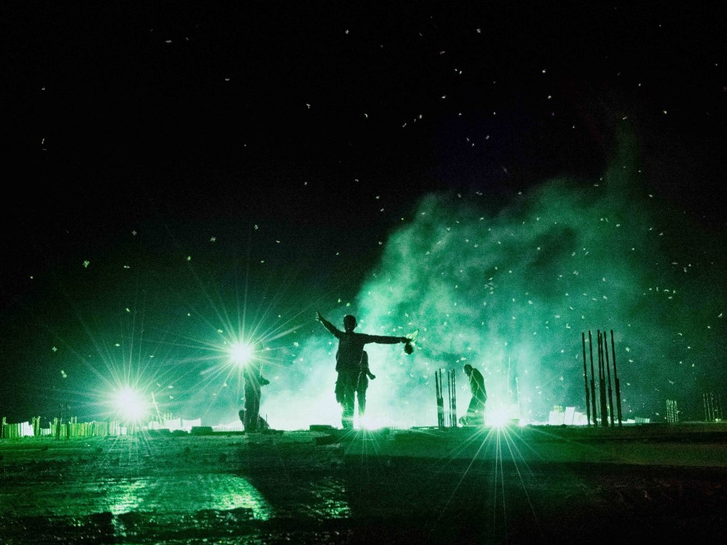 Stunning Photos of Uganda’s Nocturnal Grasshopper Trappers