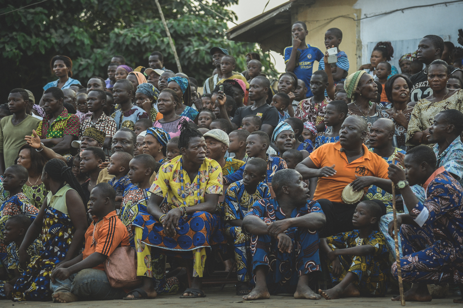 1486737479589-28-Spectators-of-Egungun-performance-are-wathing-the-event-in-fear-not-to-be-touched-by-the-dancer