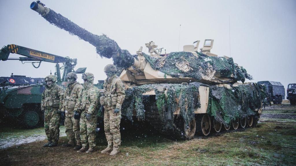 Photos of American Troops Fighting an Imaginary Enemy in a Romanian Field