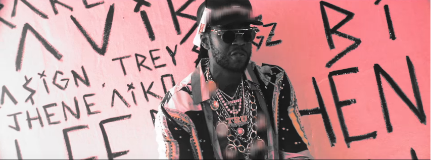 2 Chainz Parties Inside His Big Pink Traphouse in His “Door Swangin” Video