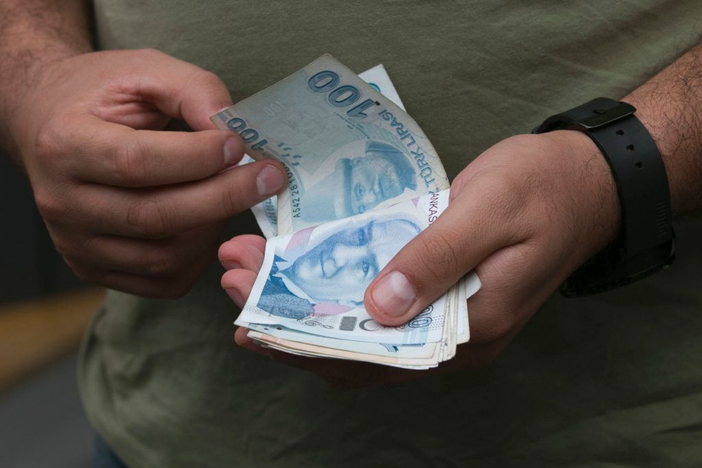 New travel restrictions between U.S. and Turkey send lira tumbling