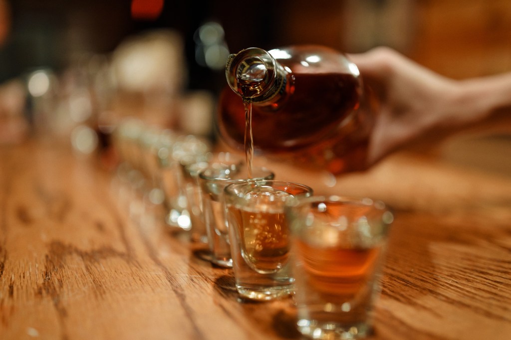 bartender pouring shots