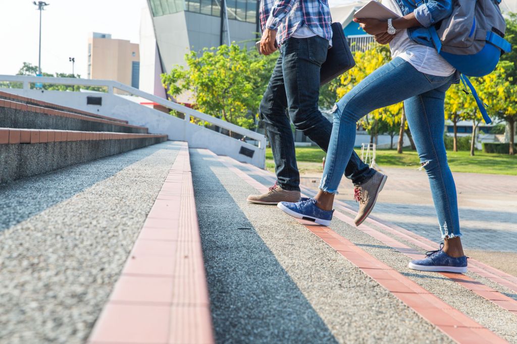 students walking up a staircase