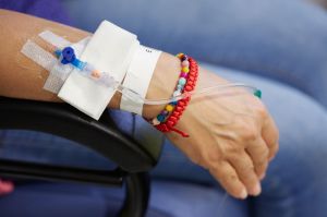 Close Up Of An Adult Patient Hand With Chemotherapy Treatment