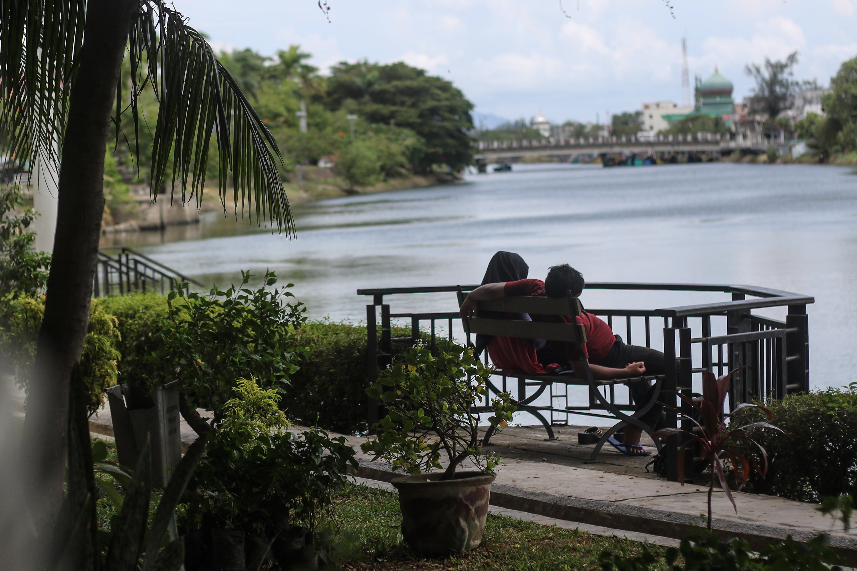 A couple relaxing in the only Indonesian province under Sharia Law, Aceh.