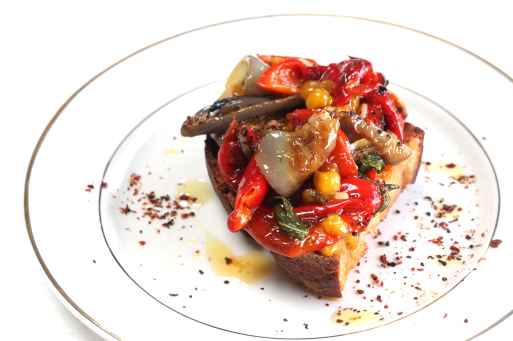 Cervo's peppers and husk cherries on toast