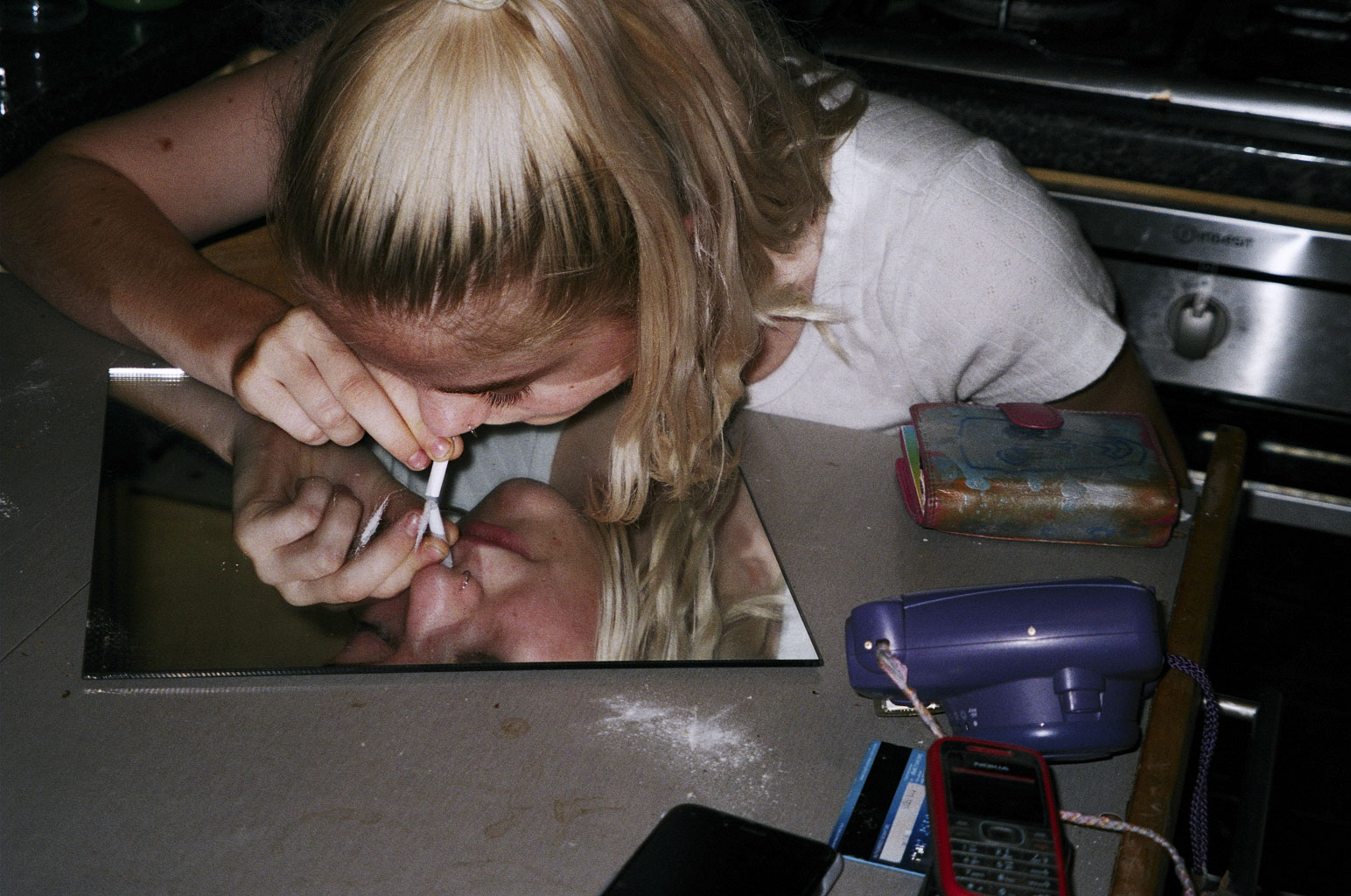 girl sniffing cocaine