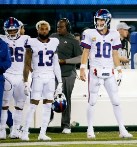 Odell Beckham, Jr., Eli Manning, and Saquon Barkley on the Giants sideline.