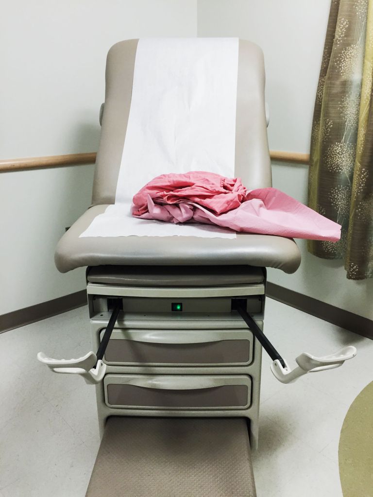 exam table in gynecologist's office