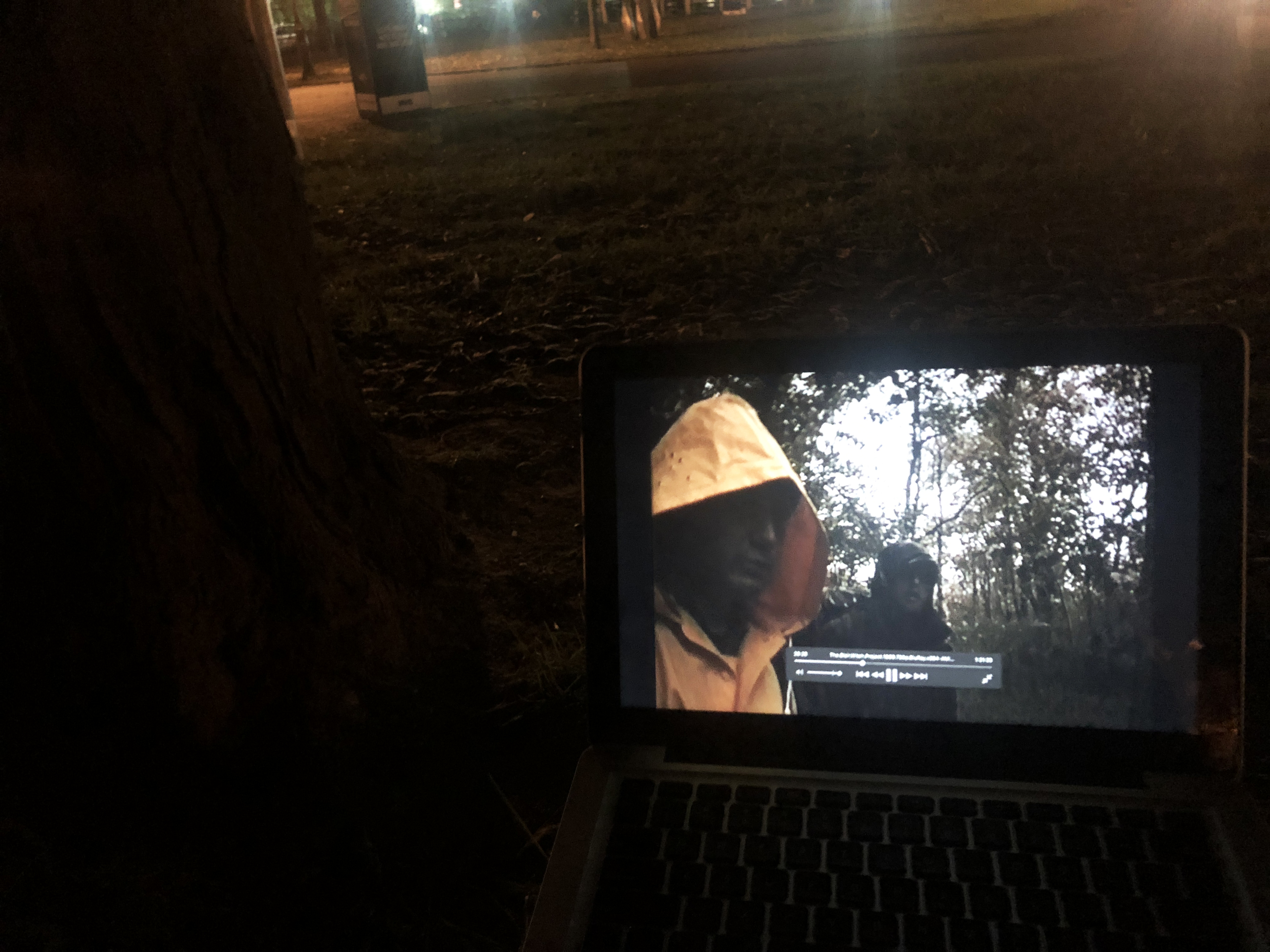 The movie 'The Blair Witch Project' playing on a laptop screen in some woods