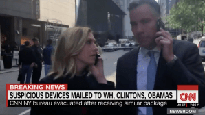 CNN anchors evacuate on air after report of bomb