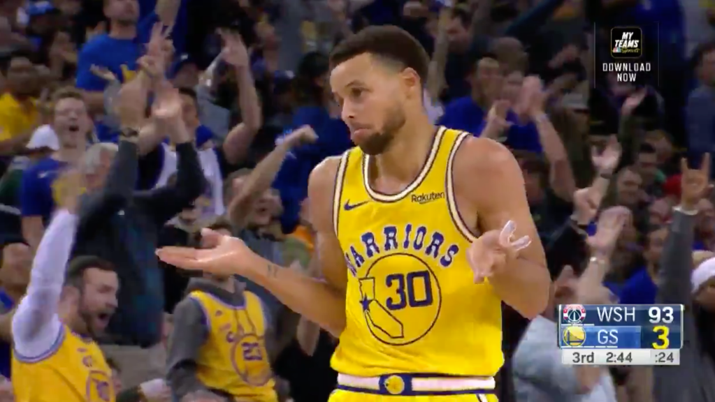 Golden State Warriors guard Stephen Curry shrugs to the crowd at Oracle Arena in Oakland after dropping his final three pointer.