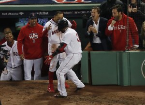 Red Sox manager Alex Cora reacts to Eduard Nunez's seventh inning home run in Game 1 of World Series.