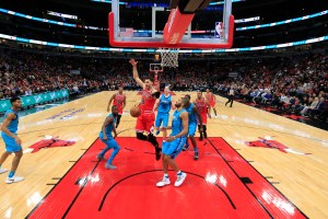 Zach LaVine celebrates after a dunk against the Charlotte Hornets