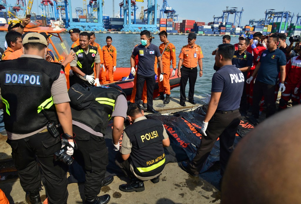 Rescuers started pulling body parts out of the water Monday after a new Boeing 737 belonging to discount carrier Lion Air crashed into the Java Sea.