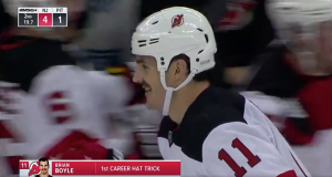 Devils center Brian Boyle celebrates first career hat trick.