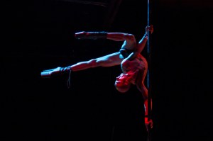 A stripper hanging off a pole