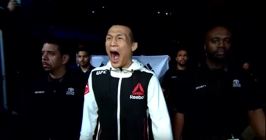 Chan Sung Jung walks to the Octagon.