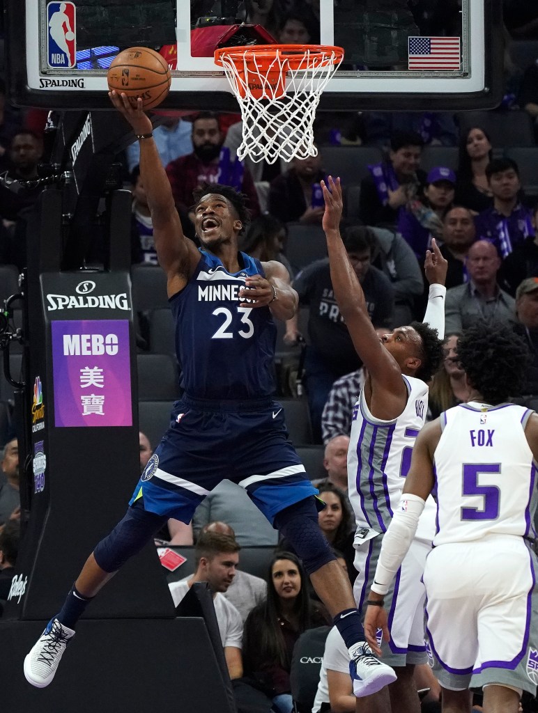 Jimmy Butler lays it up against the Sacramento Kings.