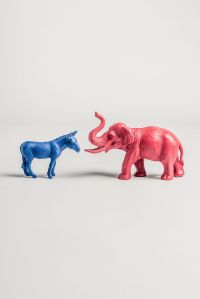 A blue donkey and pink elephant figurine