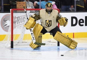 Vegas Golden Knights goalie Marc-Andre Fleury wears gold pads in a game against the Anaheim Ducks.