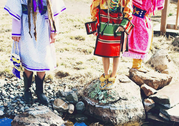 Indigenous girls by a river