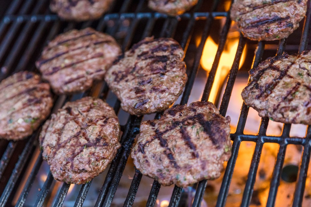 Burgers cooking on grill