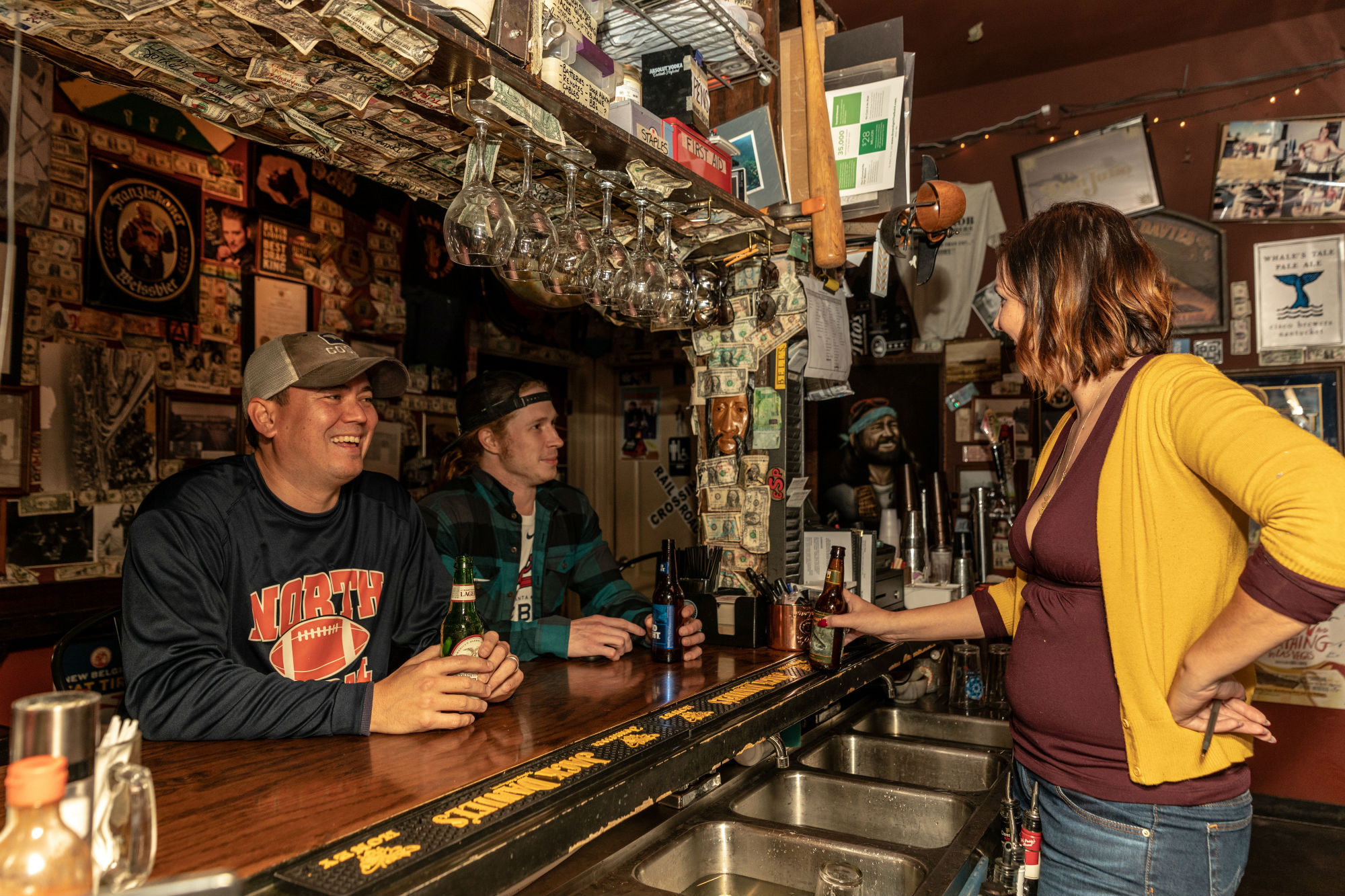 Patrons laughing at Elliott Street Pub