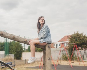 girl sitting in playground