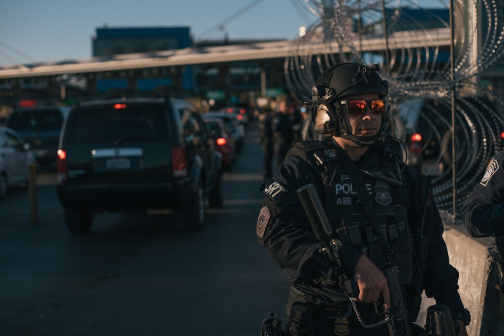 An armed officer on the border.