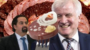 Im Vordergrund hält ein grinsender Seehofer eine Blutwurst, im Hintergrund schaut Aiman Mazyek pikiert.