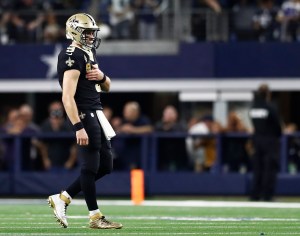 New Orleans Saints quarterback Drew Brees walking off a bit of disappointment during their Thursday night loss against the Dallas Cowboys.