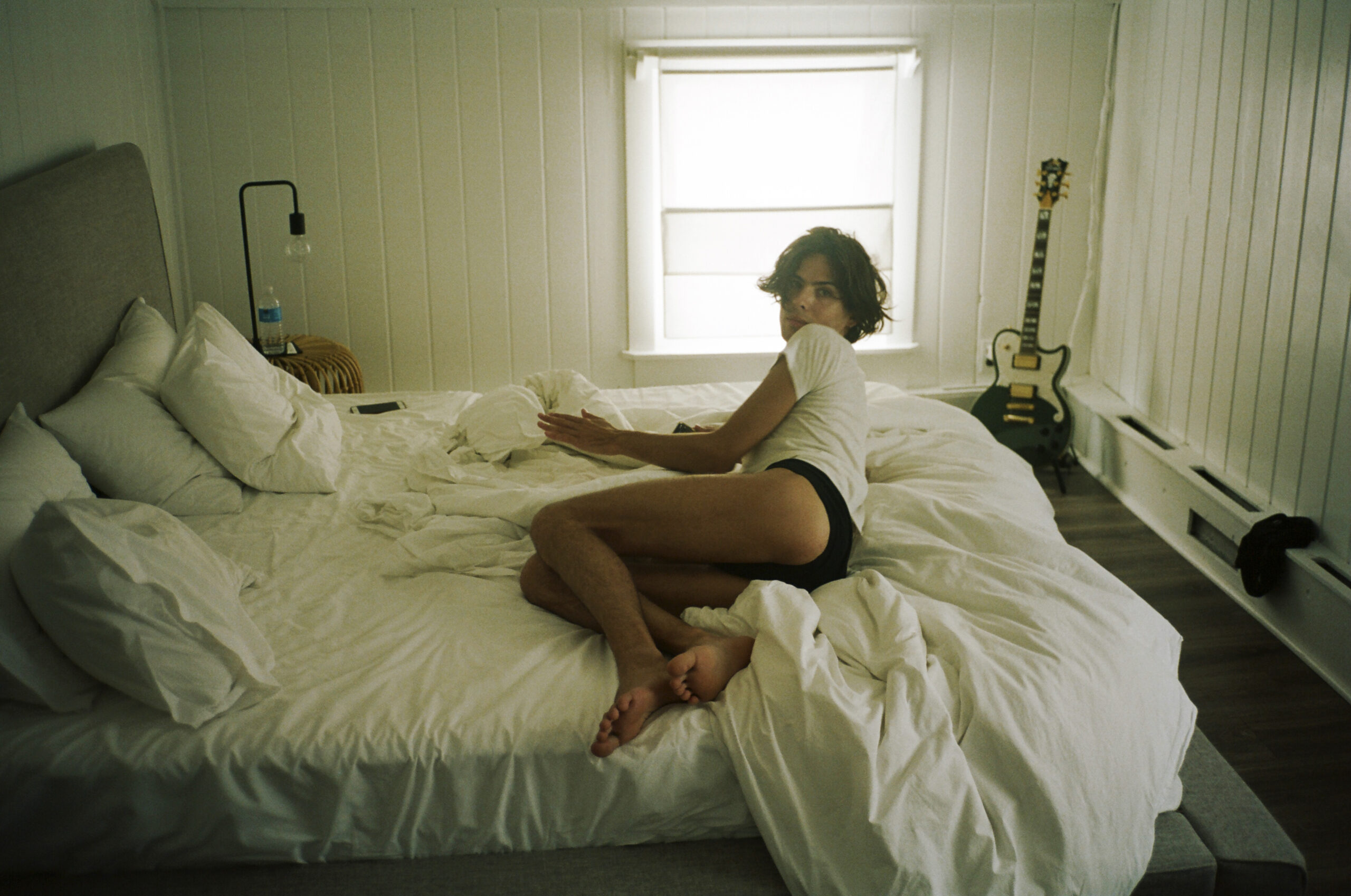 a girl lying in bed