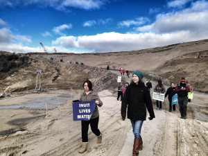 A protest walk on North Spur, a natural dam fortified as part of the Muskrat Falls megadam.