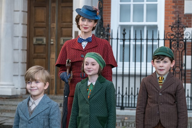 Emily Blunt as Mary Poppins, with the three children