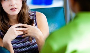 Woman sitting in a therapy session