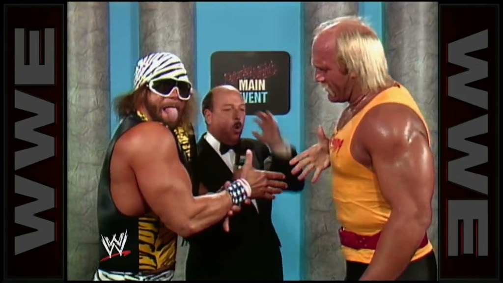 "Mean" Gene Okerlund with Macho Man and Hulk Hogan.