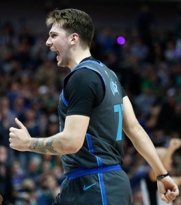 Dallas Mavericks rookie Luka Doncic celebrates.