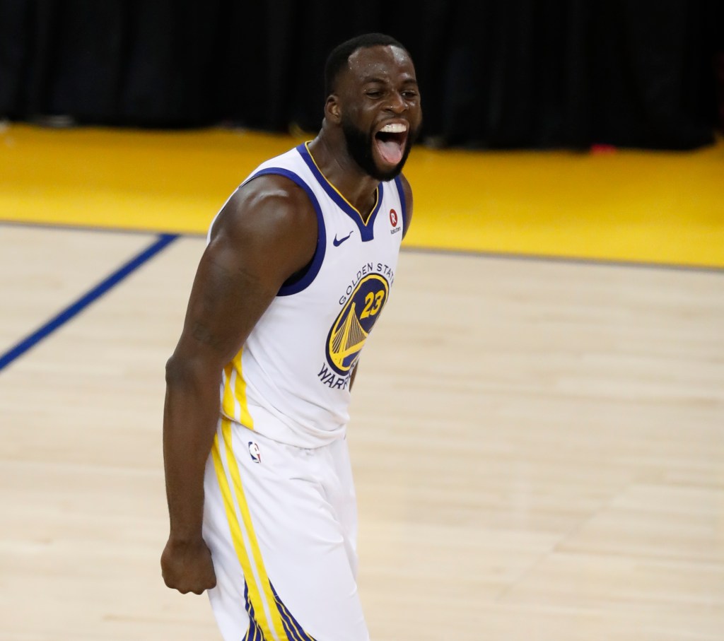 Draymond Green celebrates.