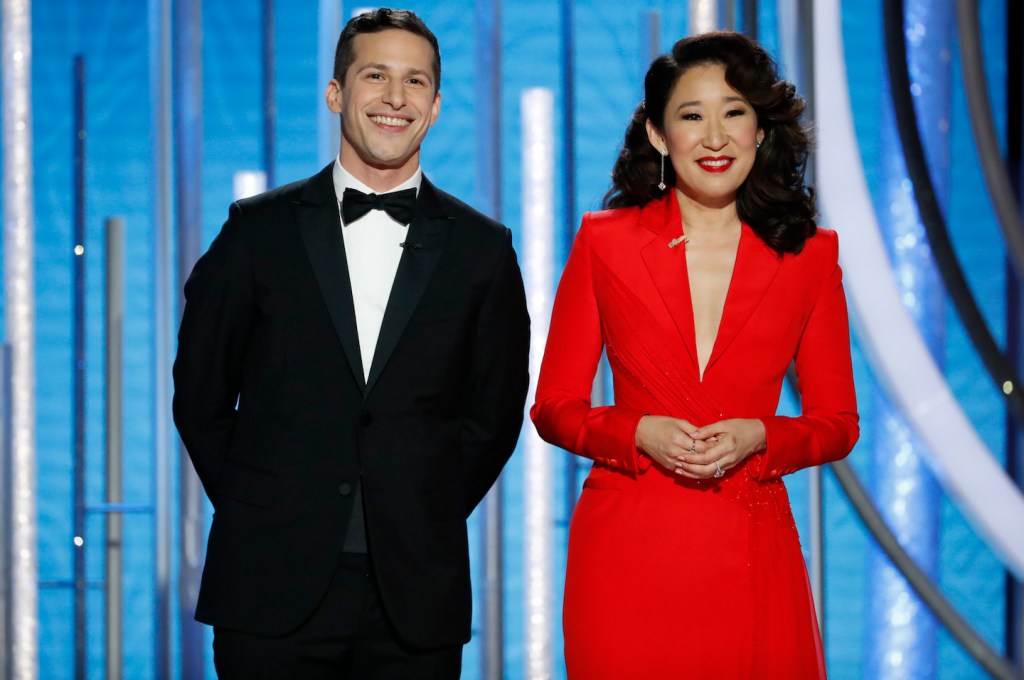 Andy Samberg and Sandra Oh during Golden Globe Awards