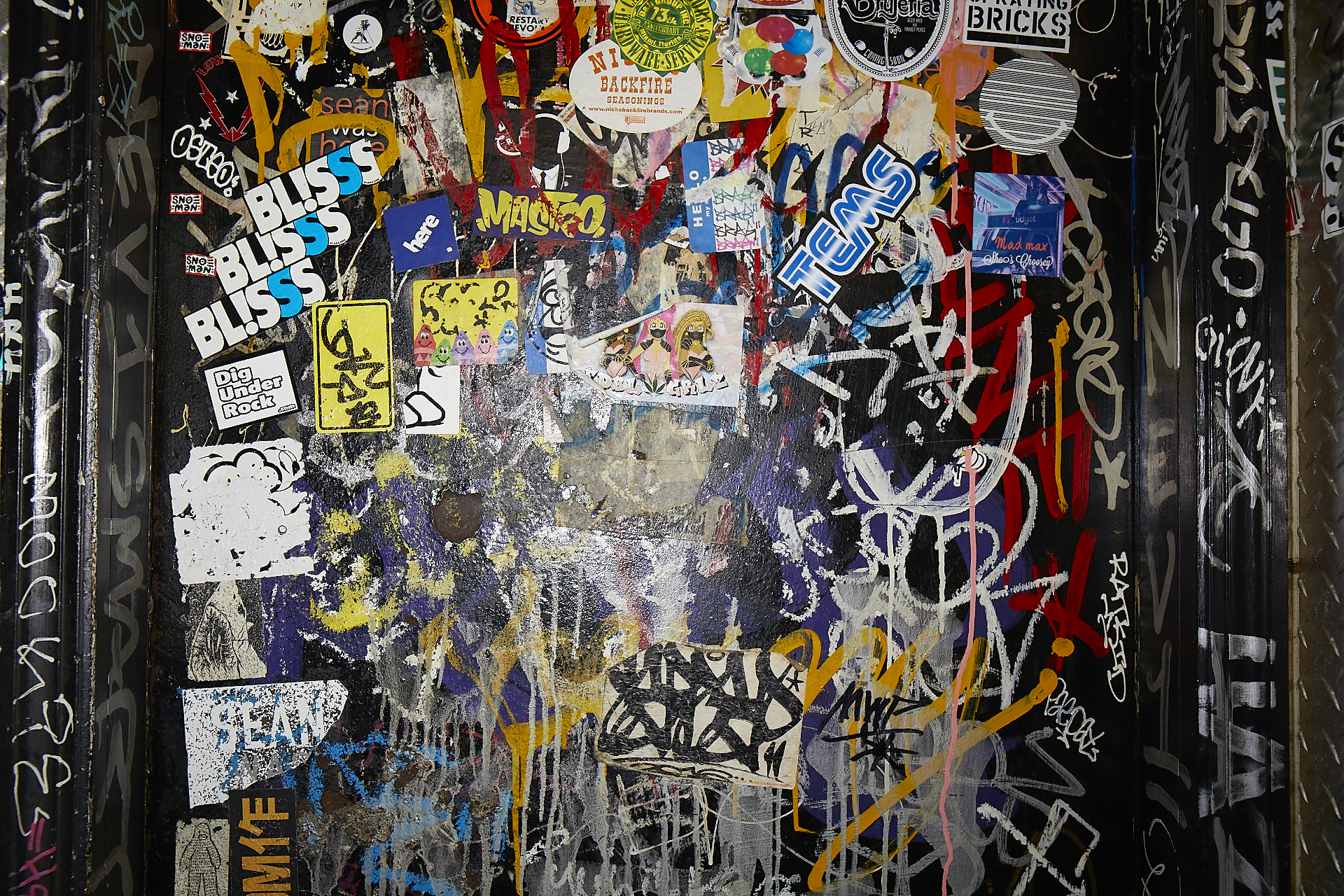 Bathroom wall at Mac's Club Deuce