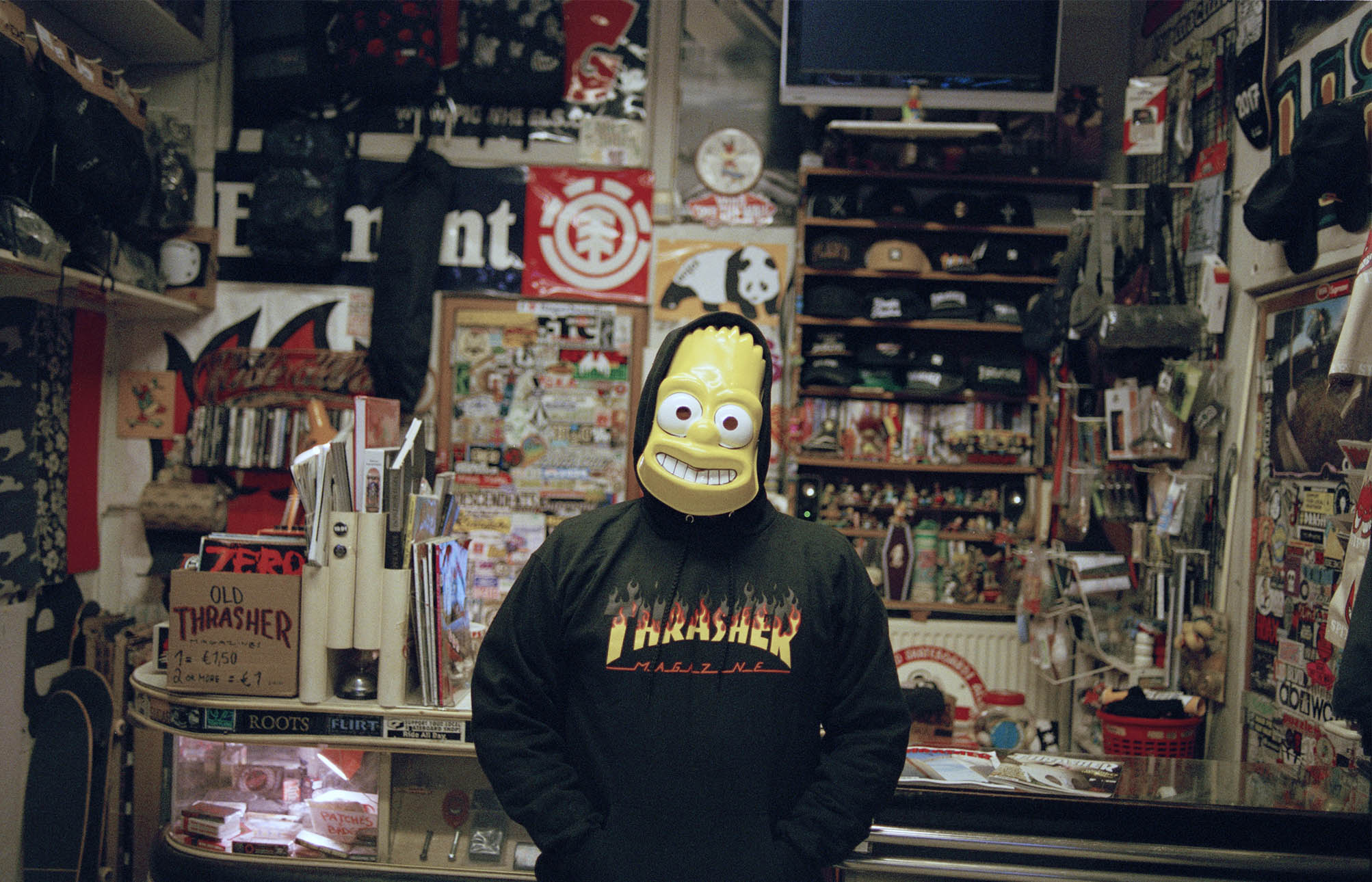 man-in-thrasher-hoodie-ride-all-day-skateboard-shop