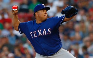 MLB free agent Bartolo Colon pitching for the Texas Rangers.