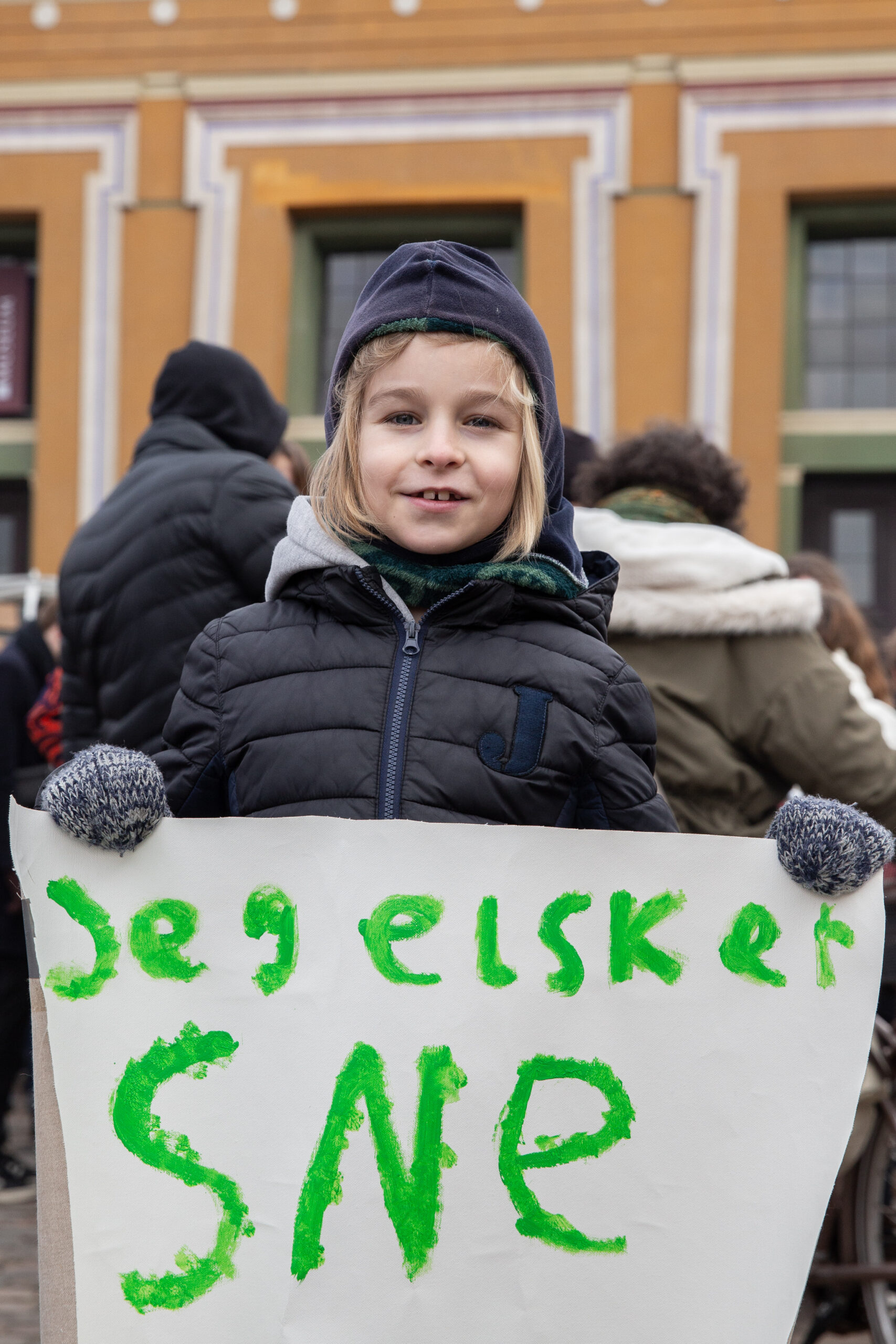 Ung demonstrant til klimademonstration