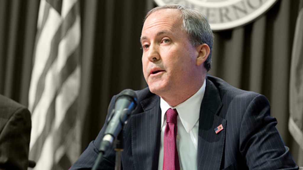 Photo of Ken Paxton with black and white background.