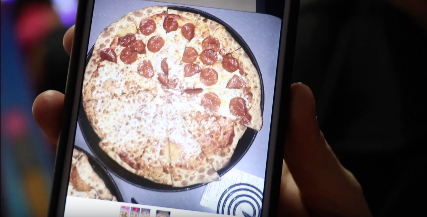 screenshot of a shane dawson video showing a chuck e. cheese's pizza