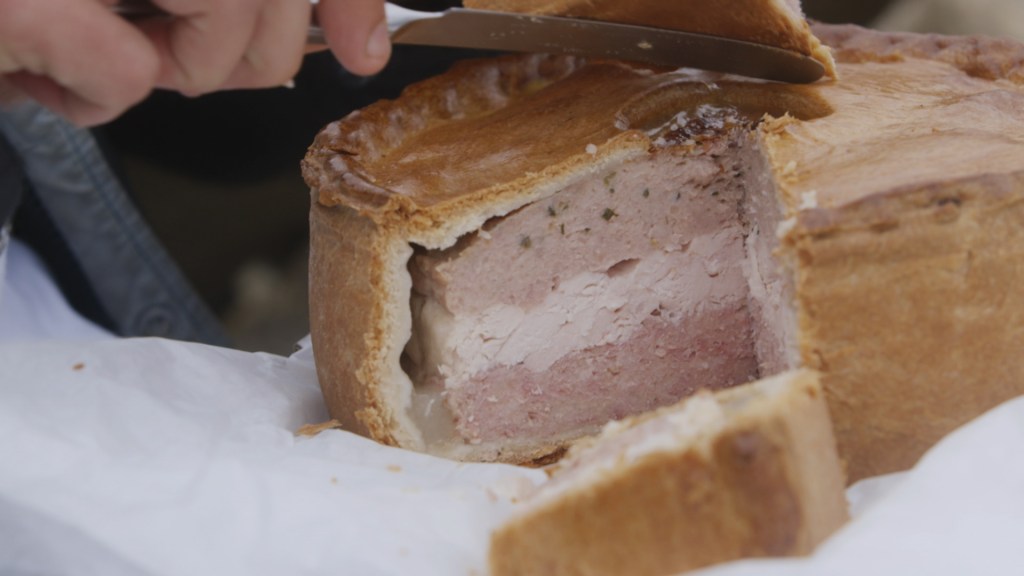 making a pork pie wedding cake