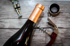 wine bottle being opened corkage