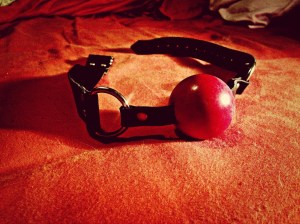 ball gag on bed